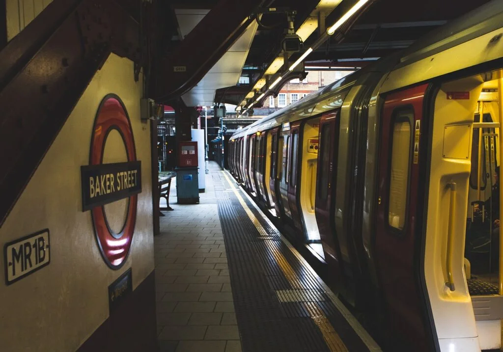 Baker Street Underground station platform with a train on the right.