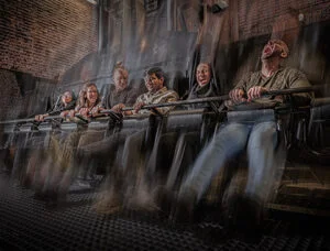 The London Dungeon 4 People experiencing a drop tower ride, showing a mixture of excitement and fear.